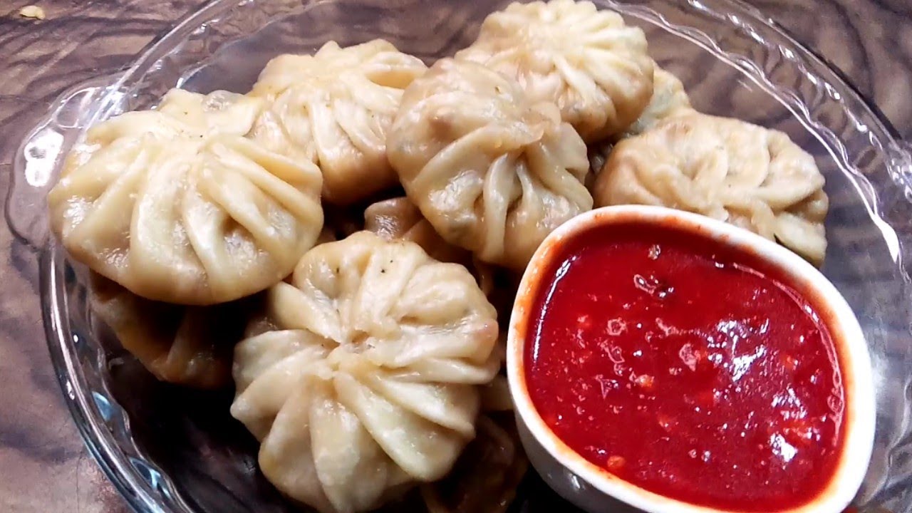 Restaurant Style Chicken Momos recipe In Urdu .Homemade chicken Momos with momo sauce. #chickenmomos
