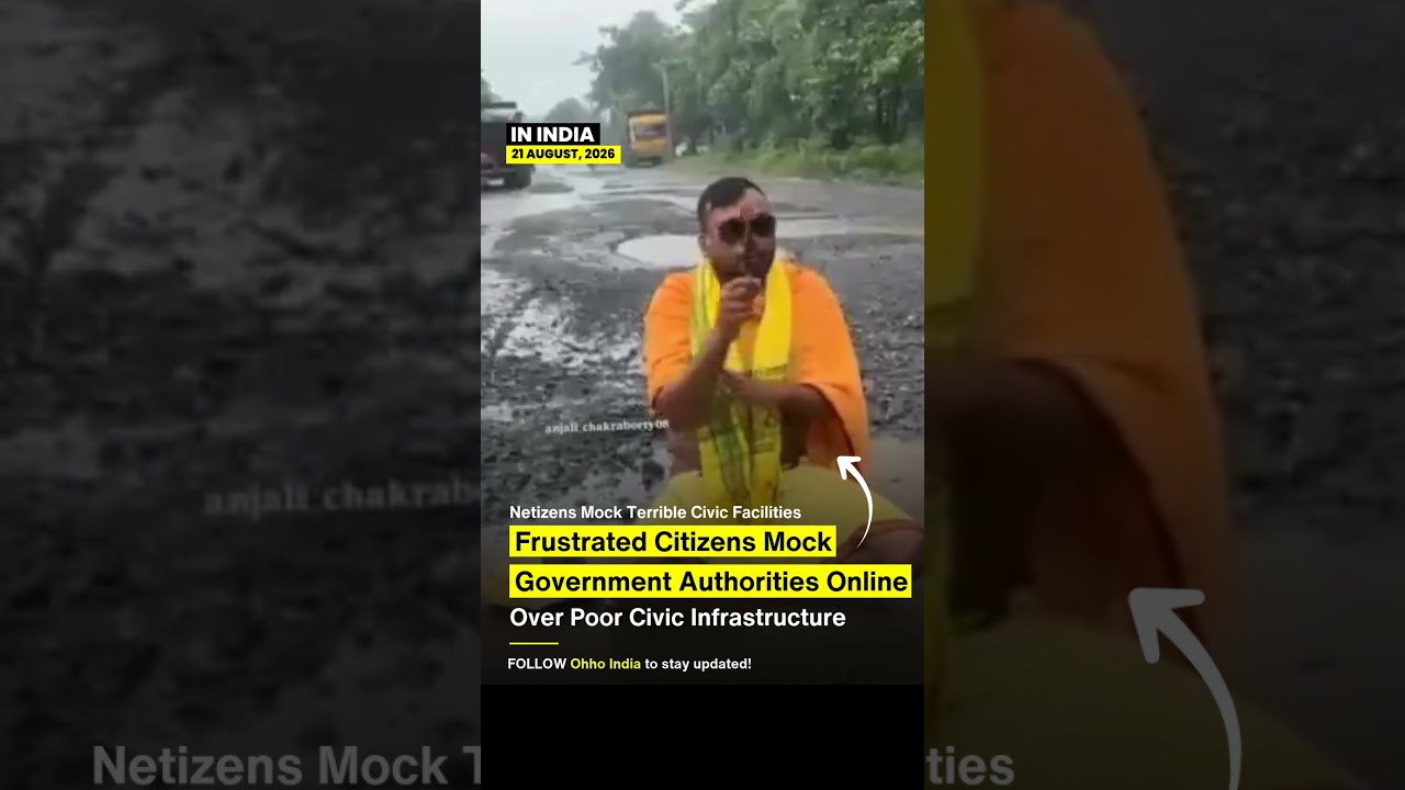 Frustrated citizen hilariously mocks authorities over pothole-ridden broken roads! 🕳️😂 #shorts