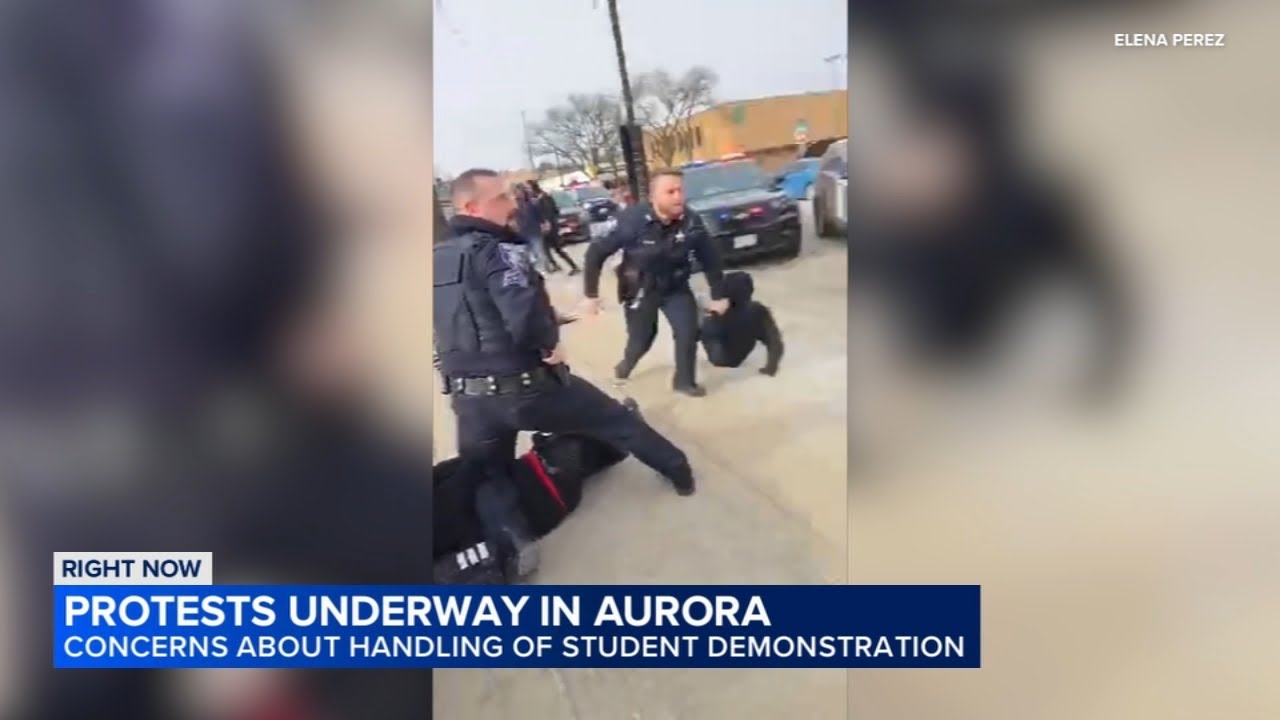 Demonstrators gather at Aurora PD after video shows officers, students clashing at anti-ICE protest