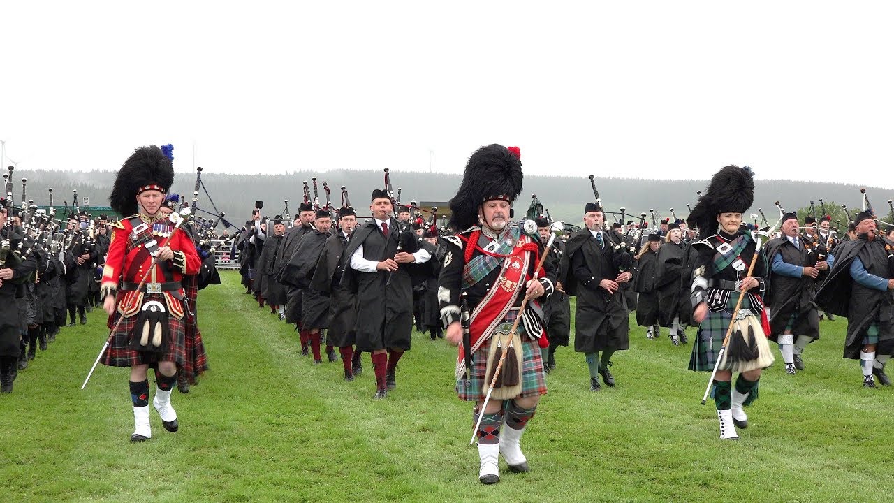 Strathisla Pipe Band celebrate their centenary with a massed band display during Keith Show in 2019