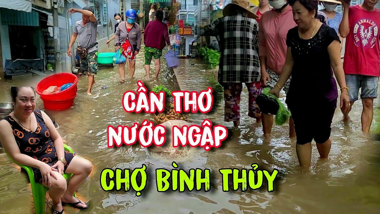 Cần Thơ nước ngập bà con chen nhau lội nước khu vực chợ Bình Thủy