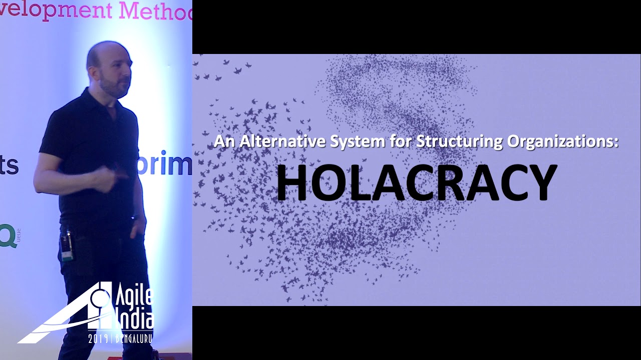 Holacracy: Unleash Entrepreneurship in your Team by Brian Robertson at #AgileIndia2019