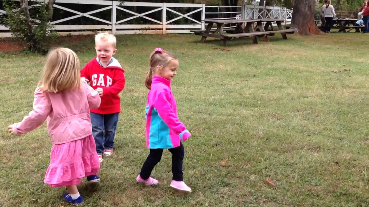 Preschool kids playing tag