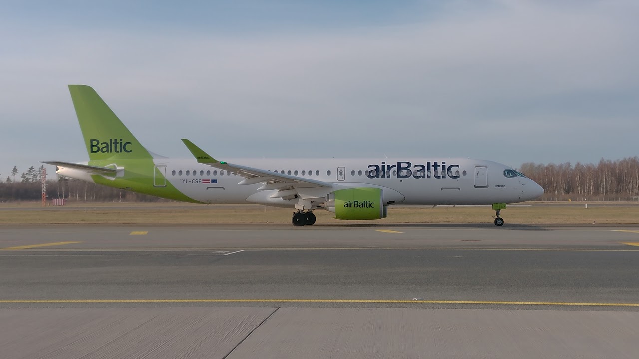 Planes landing and taxiing and taking off from RIX (Riga airport)