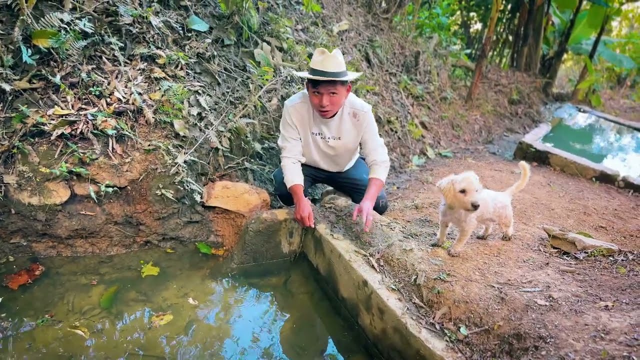 Lavando el nacedero y el tanque del agua que utilizamos en la casa