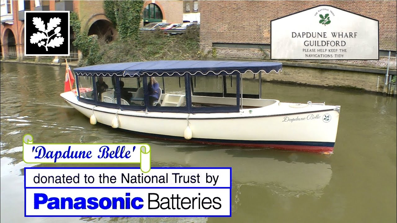 National Trust UK Electric Canal Boat. Brief History, Wey Navigation, Surrey, UK. Dapdune Wharf.