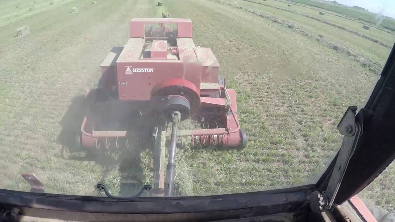 Small baler action and close up of knotters.