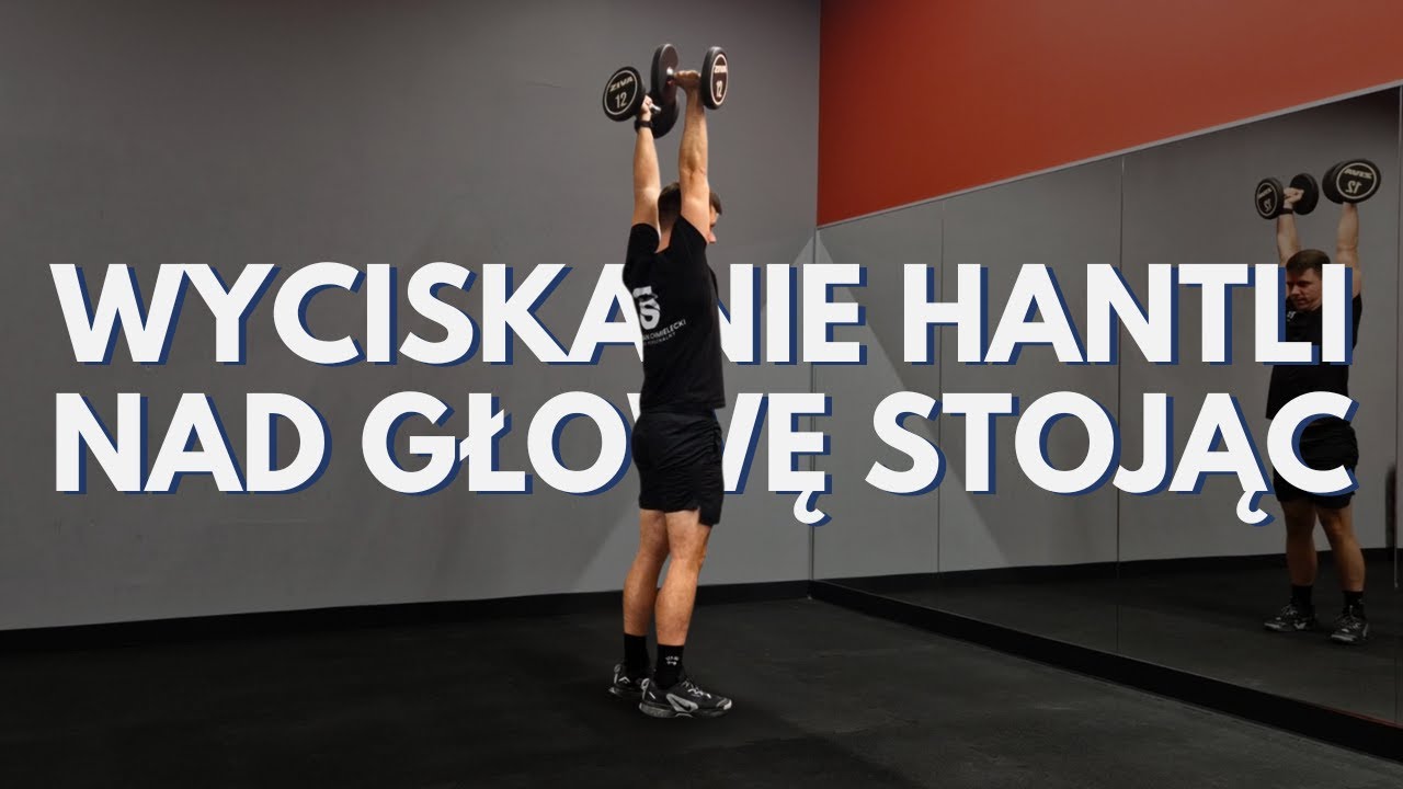 Wyciskanie hantli nad głowę stojąc