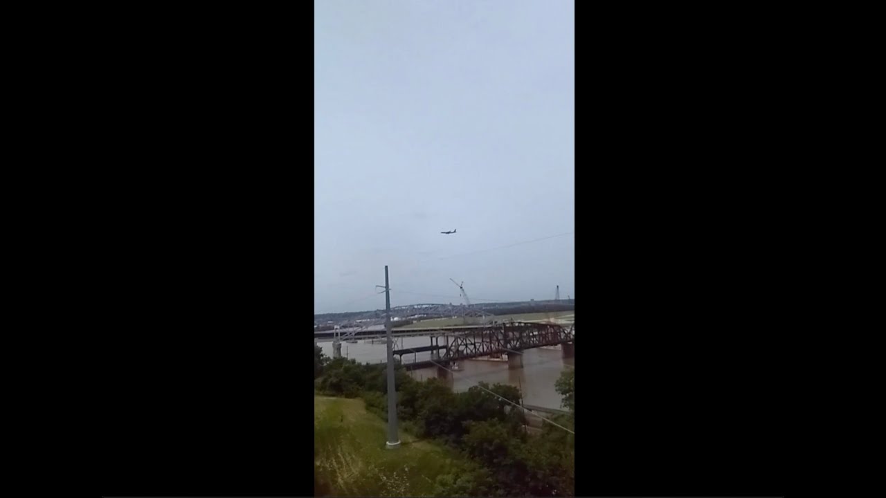A Boeing KC -135 Stratotanker Military Aircraft flying over downtown Kansas City! 