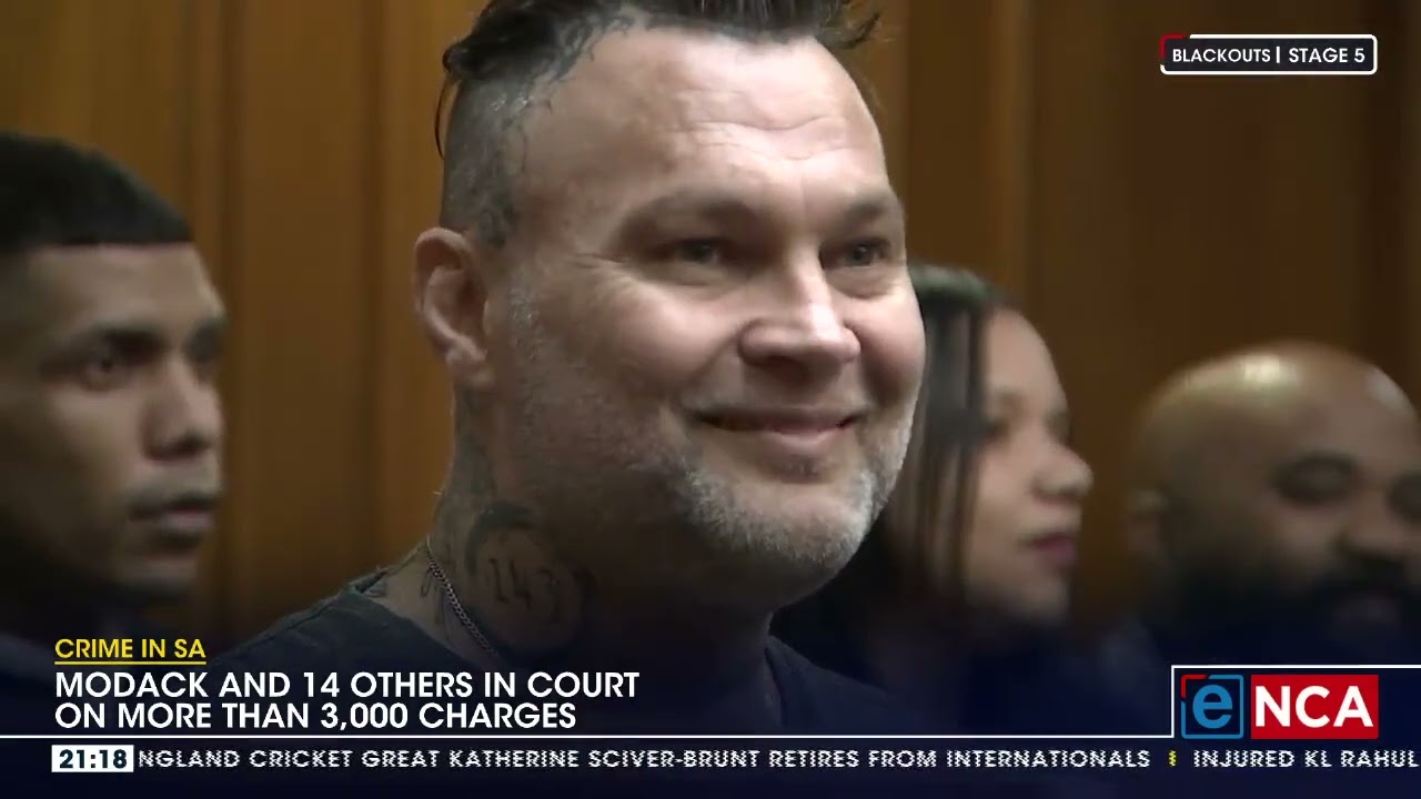Modack and 14 others in court on more than 3,000 charges