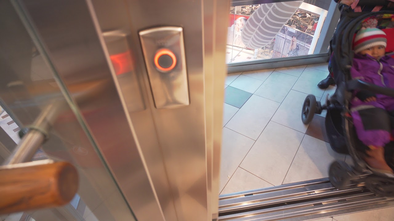 Sweden, Stockholm, Haninge Centrum, KONE elevator ride - going down