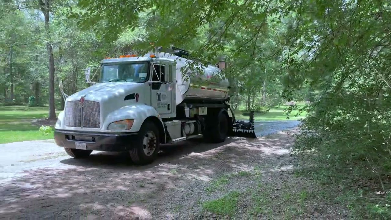 CHIP AND SEAL OUR 800 Foot DRIVEWAY.
