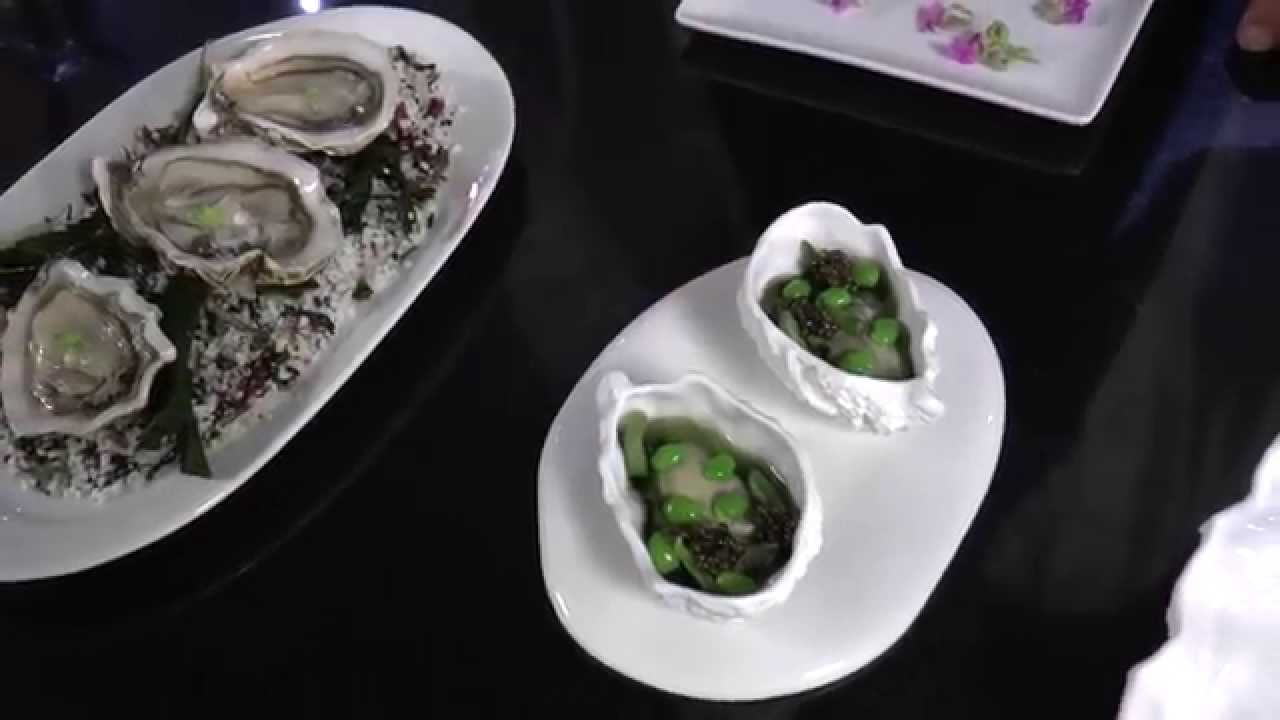 Donckele prepares oysters at the 3 Michelin La Vague d'Or in Saint-Tropez