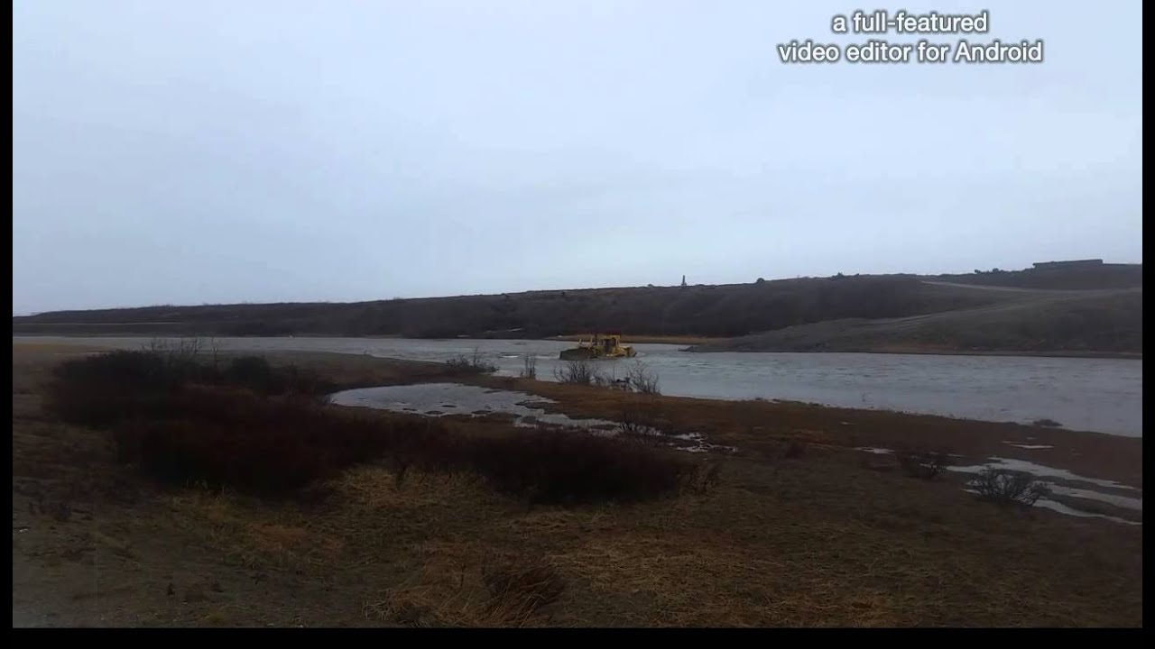 How to cross a river with a Cat D9 Dozer