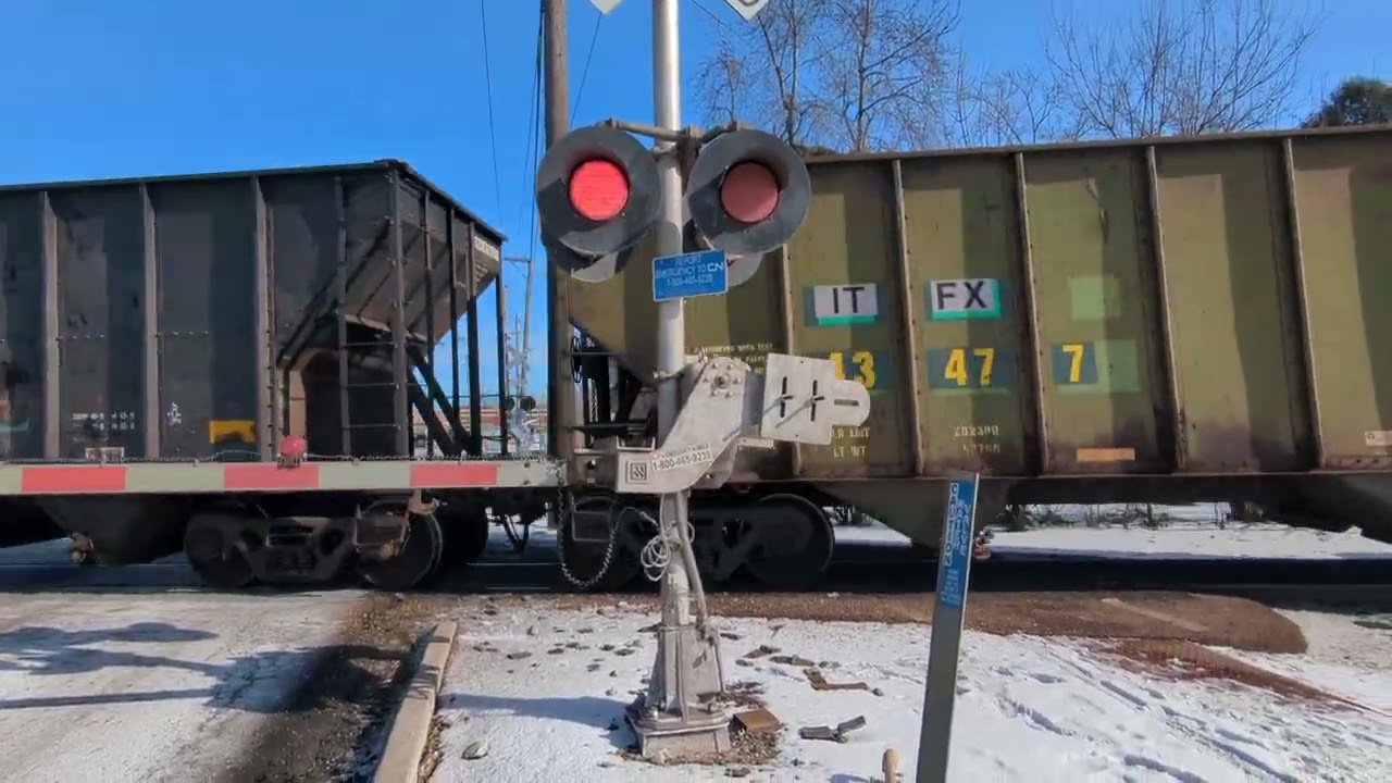 Southbound CN Manifest with a Citirail unit trailing second on the Leightion sub at JB tower