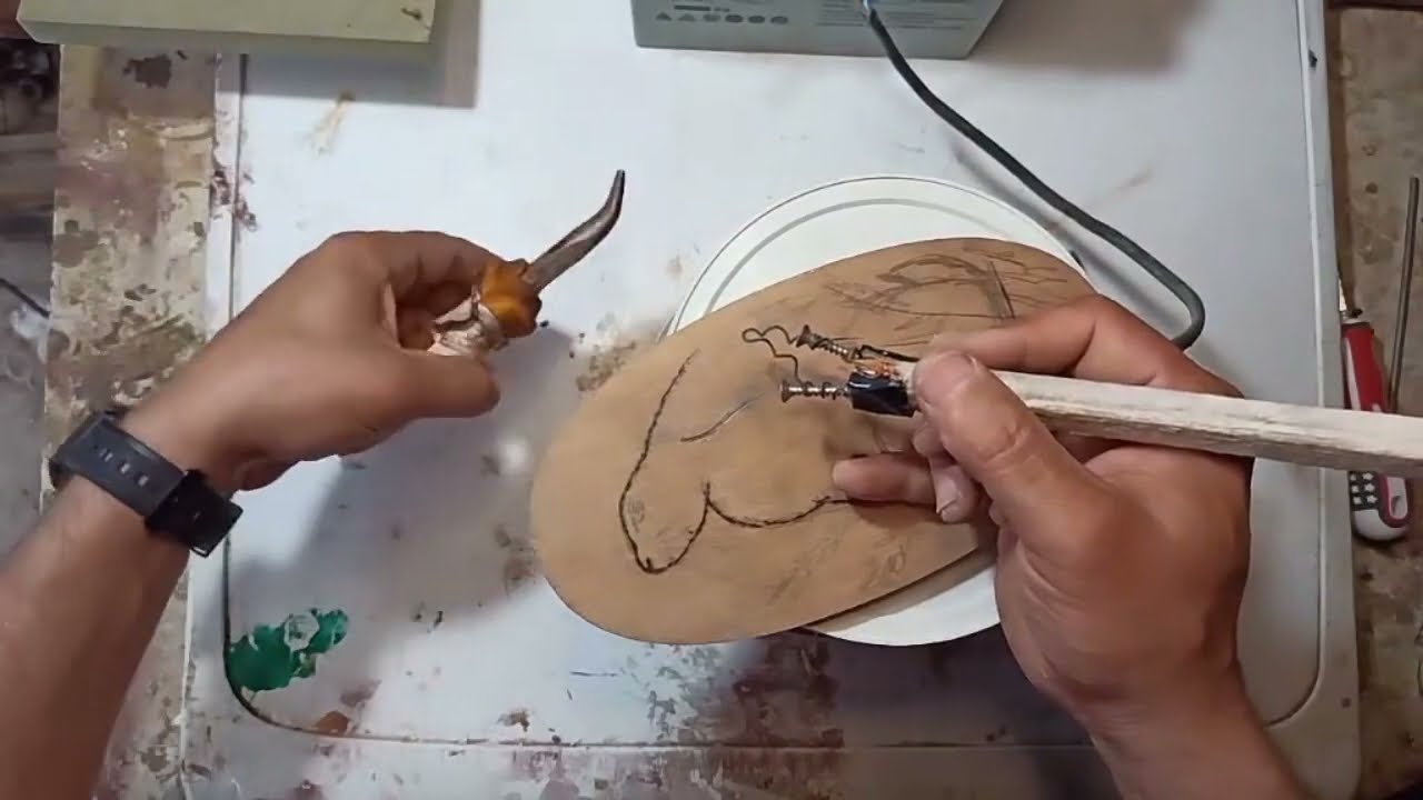 كيف ترسم بالحرق على الخشب ؟