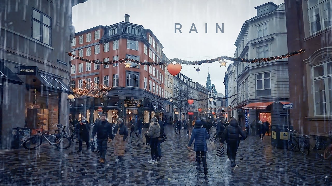 Biking under the rain in Copenhagen city center