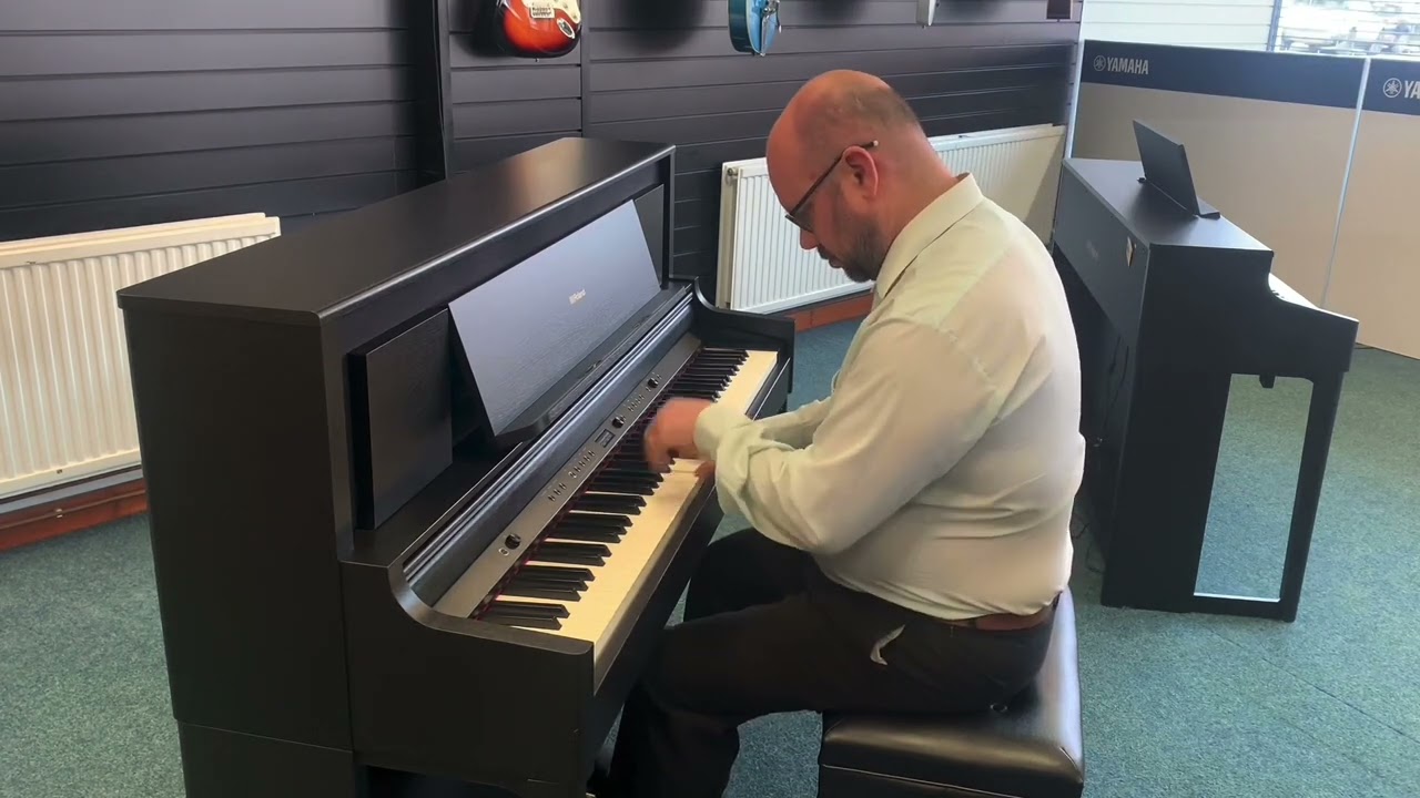 Martin plays the Roland LX706 for World Piano Day