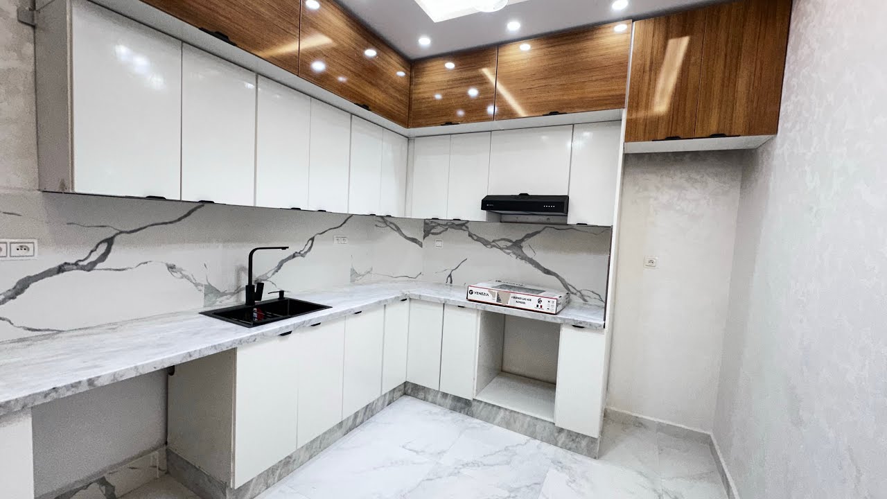شقة طابق الأرضي بالكراج الثمن 48مليون+دعم☎️+212665933983