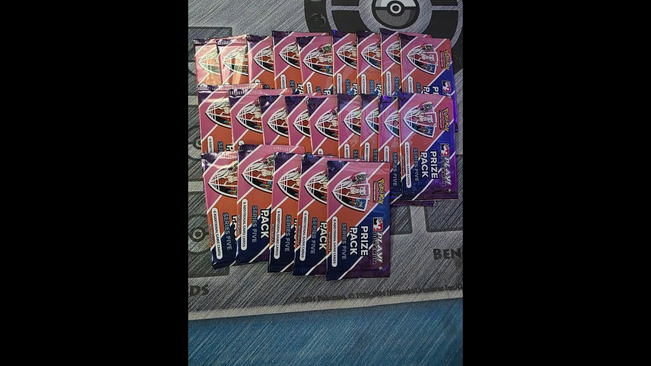 opening a stack of Play Pokemon series 5 reward packs