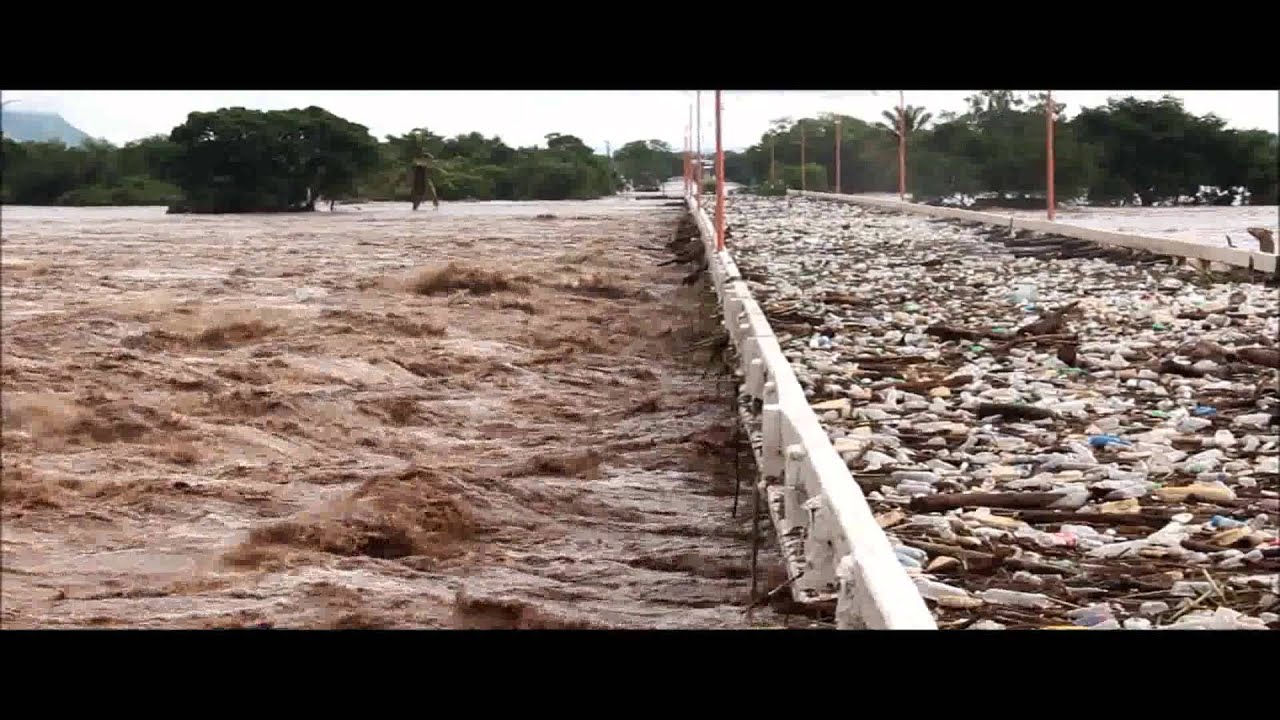 Coyuca de Catalán, antes y durante la inundacion Puente Miguel Aleman