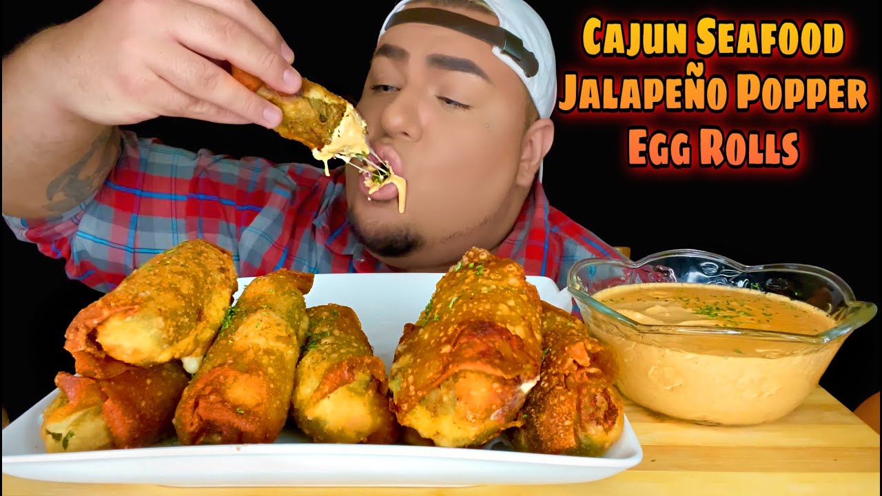 CHEESY CAJUN SEAFOOD JALAPEÑO POPPER EGG ROLLS W/ SPICY CAJUN CREAM SAUCE