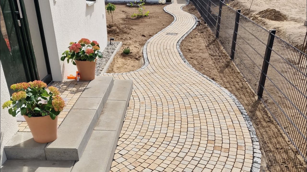 Pflasterverlegung in geschwungenen Formen als Gartenweg Pflasterarbeiten mit Anspruch - Werder Havel