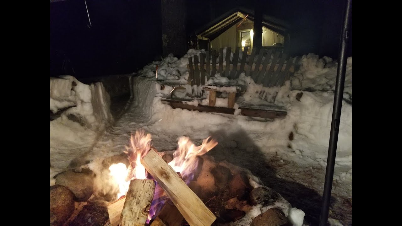 CAMPFIRE BAKED POTATO. Wrapped in foil and cooked in the coals. Tent cooking.