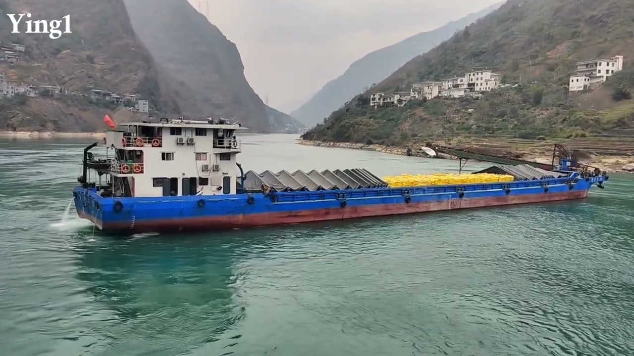The barge turns and crosses the narrow river - My life on the river