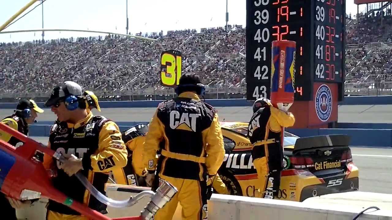 Jeff Burton's 31 CAT car pit crew on his first pit stop at the 2013 Autoclub 400