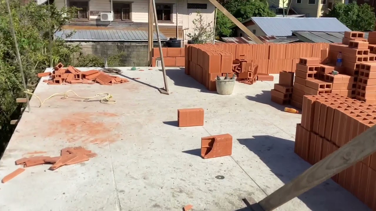 How we build houses in Trinidad (brick work/roof)