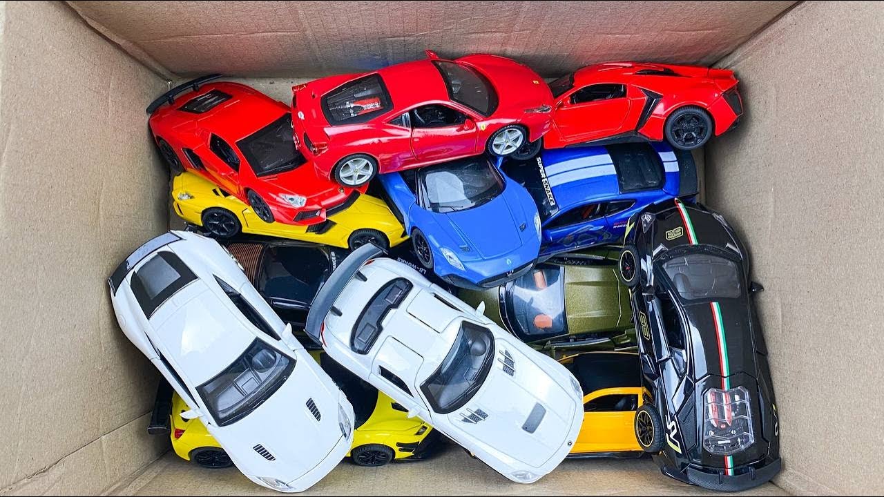 Box Full of Model Cars -Mazda Mx5, Koenigesgg Jesko, Lamborghini Scv12, Byd Yang Wang U8, Toyota Car