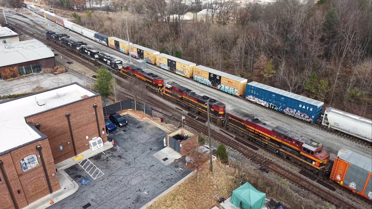 A CSX Freight Finally Clears for Amtrak 19 to Depart, an Overpowered NS Freight with Three KCS EMDs