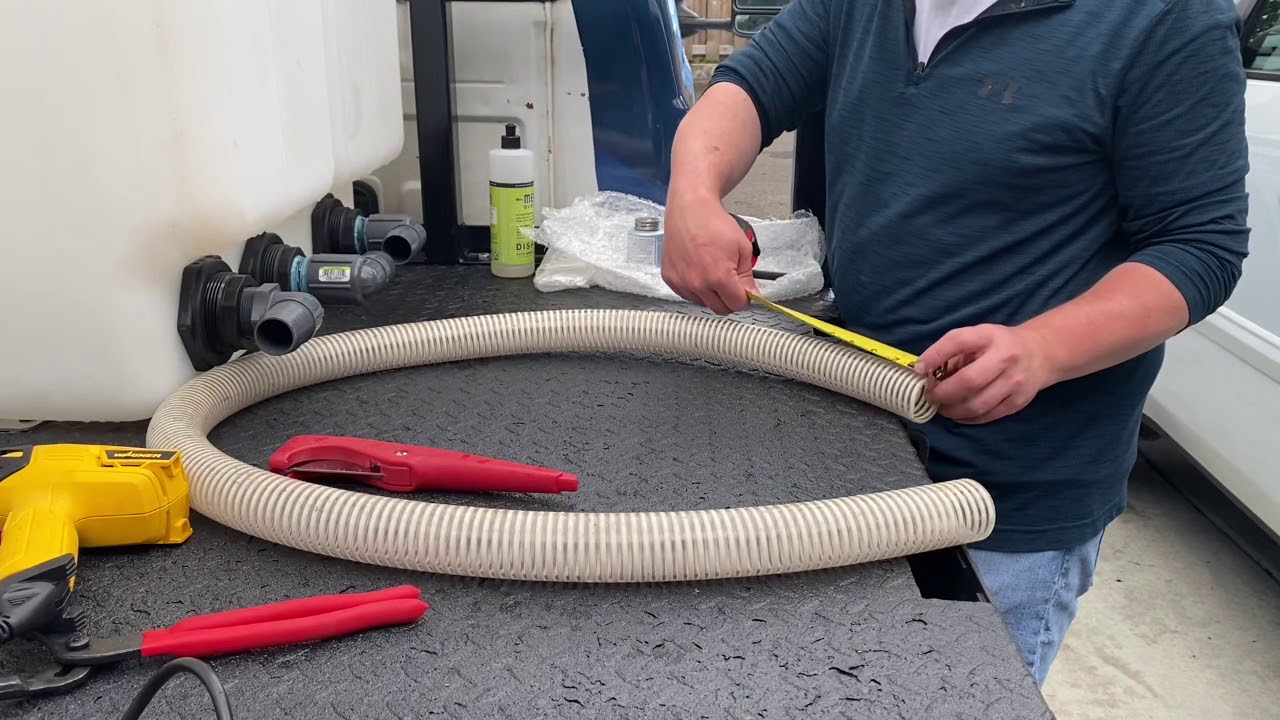 How to plumb two pressure washer buffer tanks into one