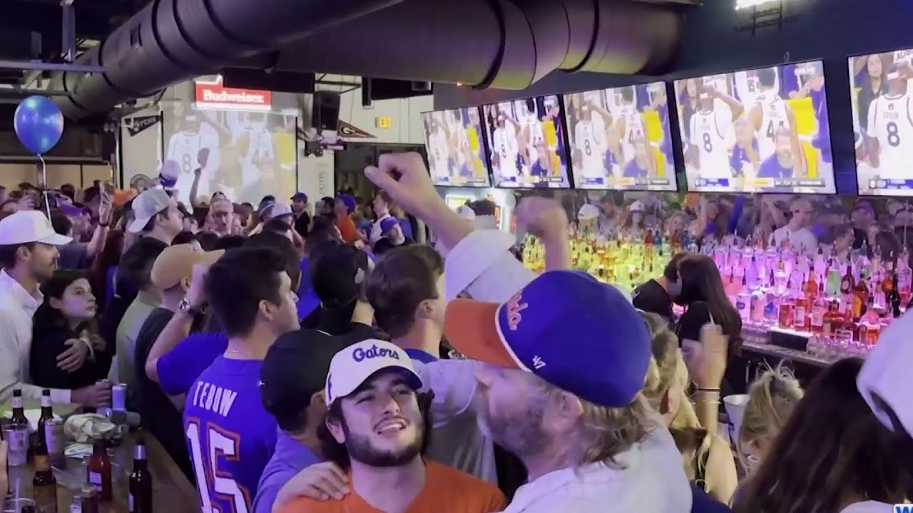University of Florida basketball fans gather to watch and celebrate the Gator's win over Auburn