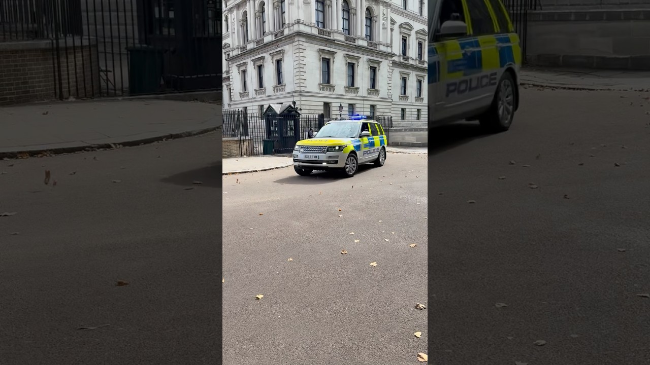 Police Special Escort Group leaving rear exit of Downing Street London Keir Starmer prime minister
