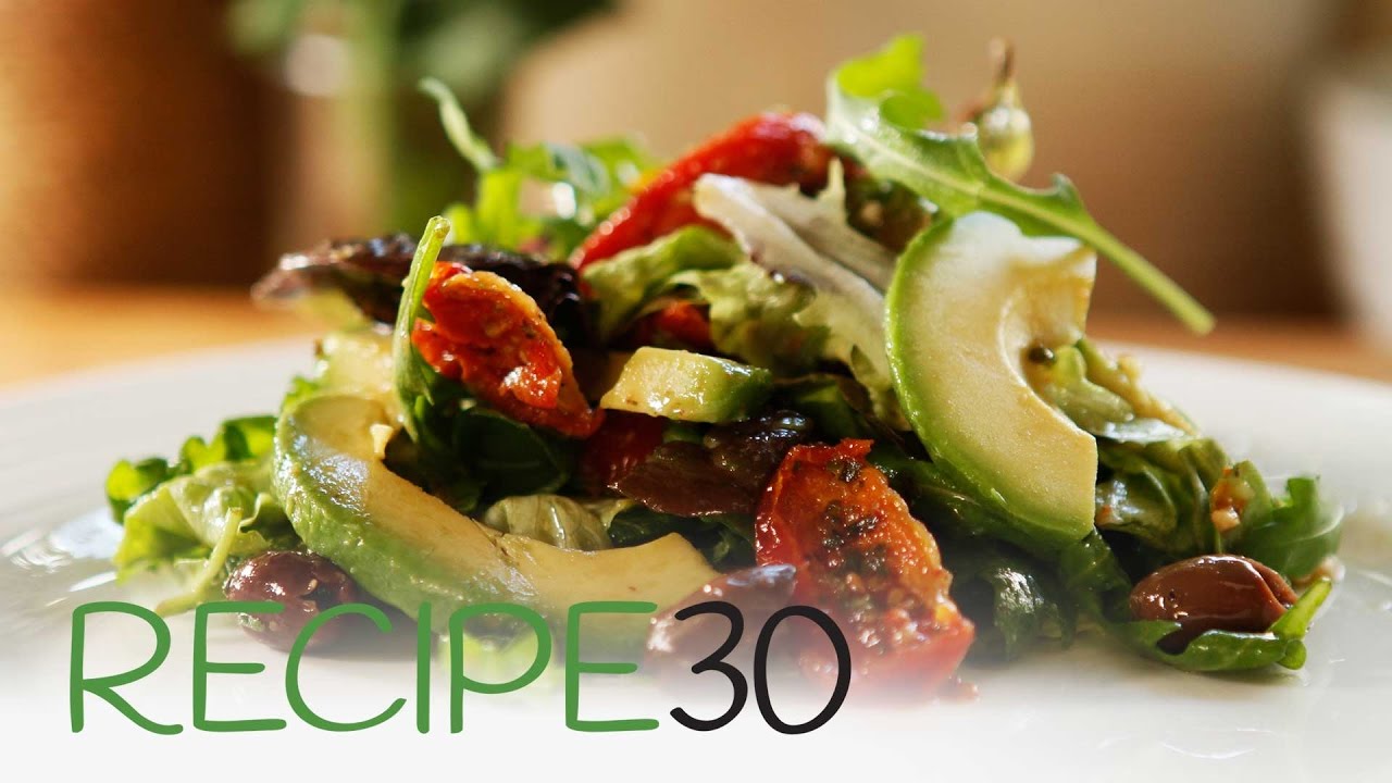 Summer Salad with avocado, olives and semi dried tomatoes