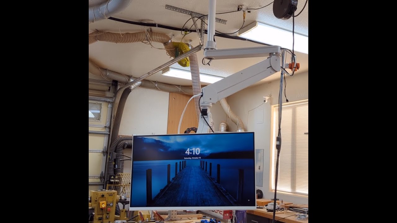 Ceiling mount articulating arm to mount my monitor and computer for my AVID CNC machine