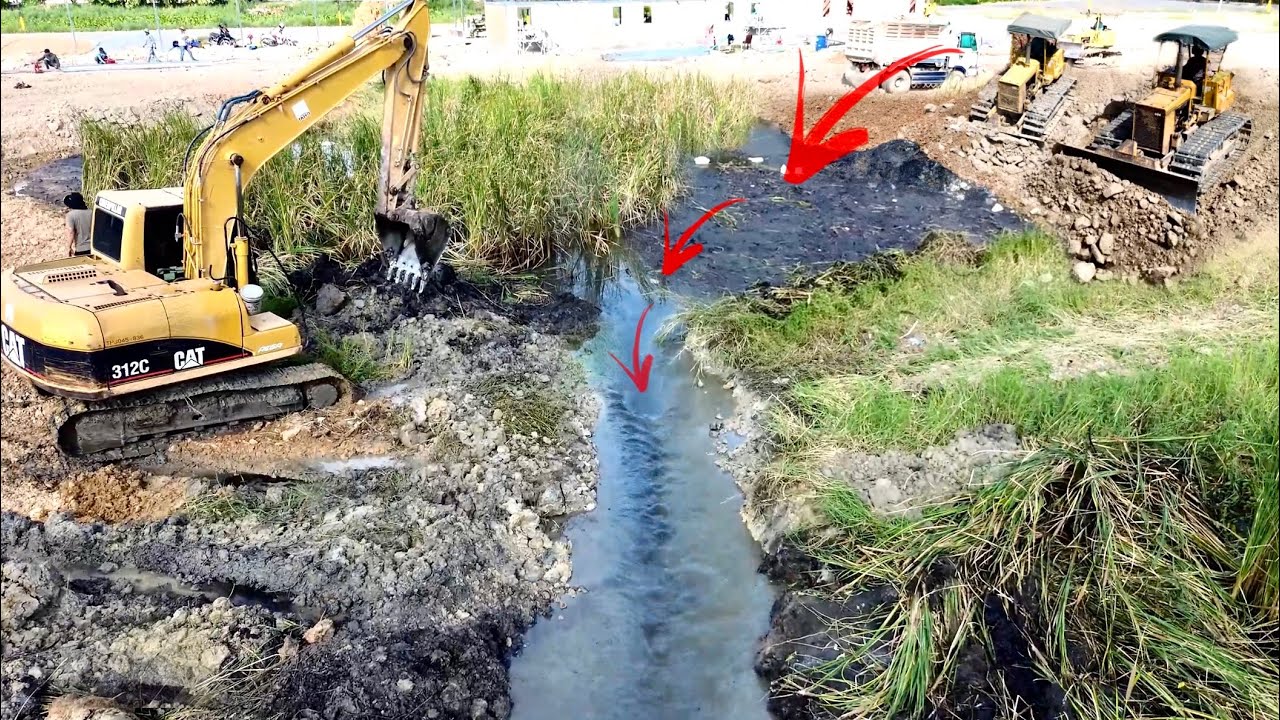 CAT Excavator Scoop Out Mud & Vegetations - KOMATSU Bulldozers Push Rock Into Pond