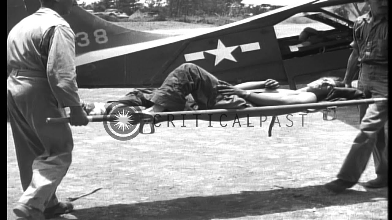 163rd Liaison Squadron Stinson L-5B airplanes fly low over the water, Okinawa, Ry...HD Stock Footage