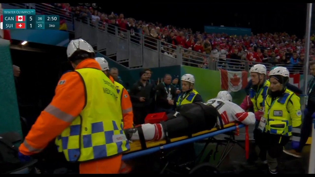 Kevin Fiala is stretchered off at the Olympics