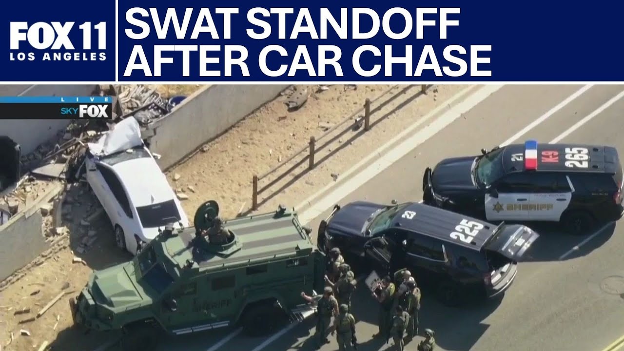 LIVE: Police chase ends in crash, tense hours-long standoff | FOX 11 LA