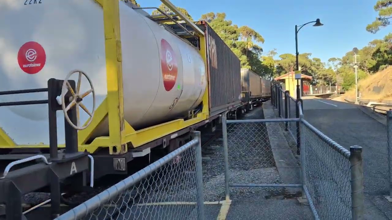 NR74 and NR81 hauls a very long and slow 4PM4 PN intermodal passes through Belair. 7/3/26 8:26am