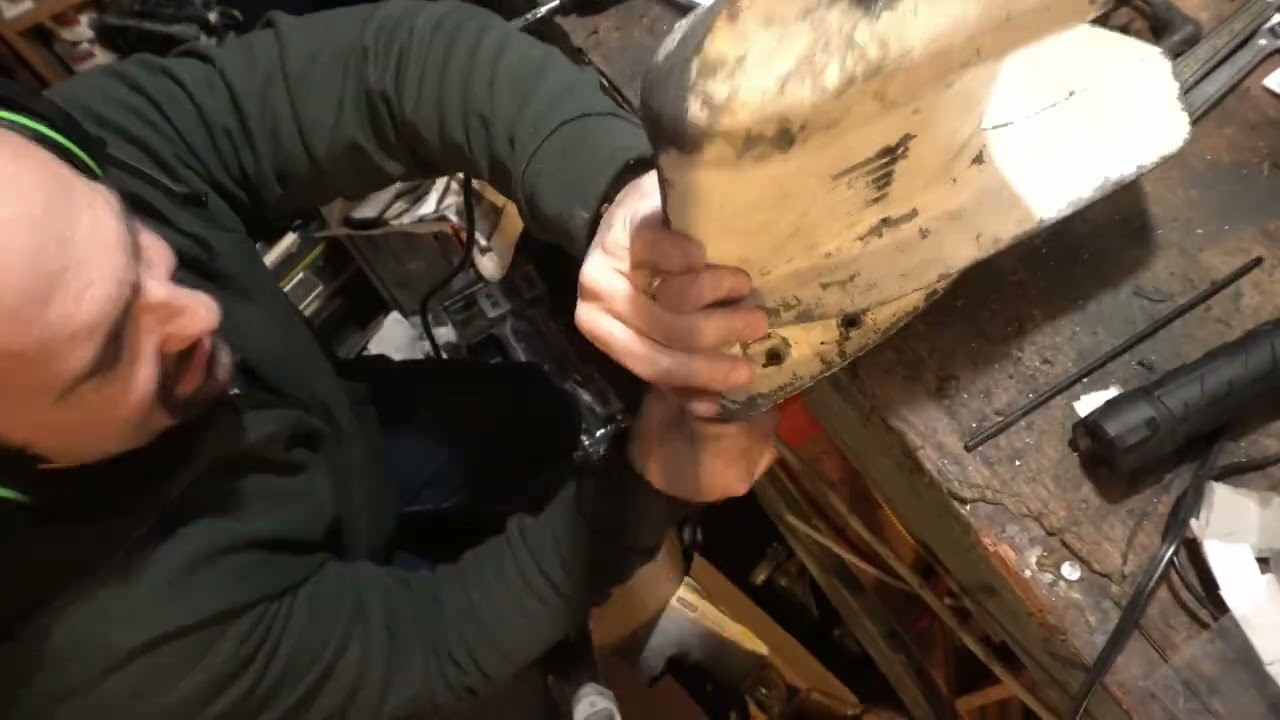 HOW TO REMOVE THE SHIFT SHAFT SEAL FROM A 9.9 15HP JOHNSON EVINRUDE OUTBOARD MOTOR