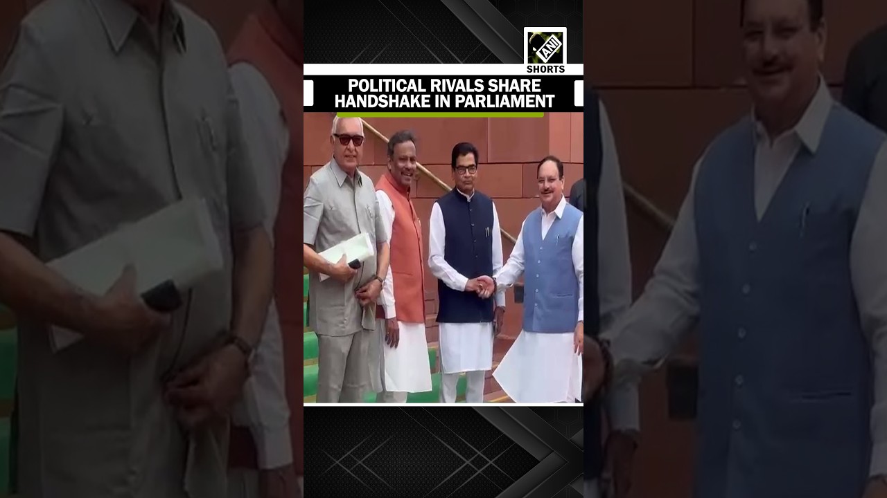 Union Minister and BJP MP JP Nadda shakes hands with SP MP Ram Gopal Yadav at Parliament
