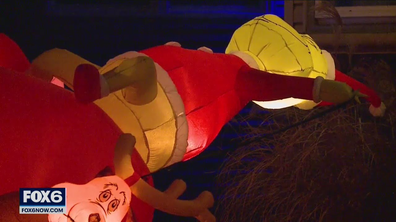 Wind threatens Candy Cane Lane inflatables | FOX6 News Milwaukee