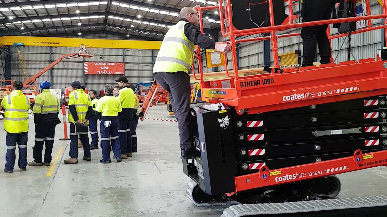 George Evangelidakis from Coates Hire climbs into the Athena 1090