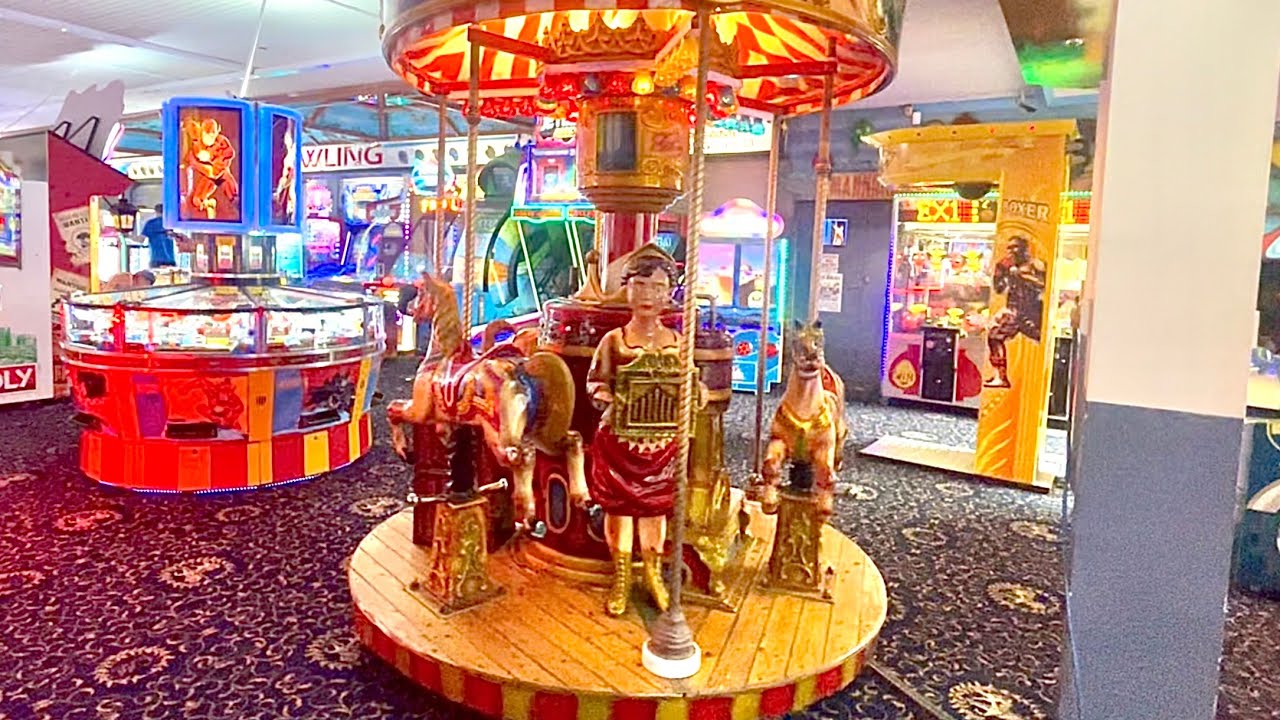 Peter Petz Merlin’s Classic Carousel Coin Operated Kiddie Ride