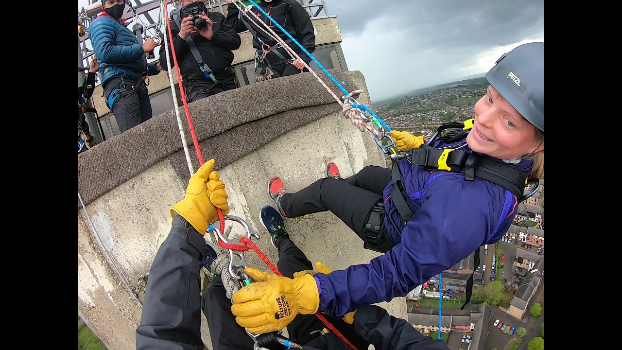 Abseiling down Northampton lift tower