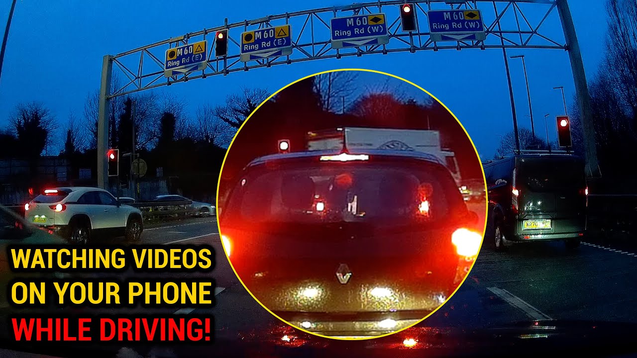 Mobile phone in a cradle, but watching a video | Is this legal? Can @BlackBeltBarrister Help Out?